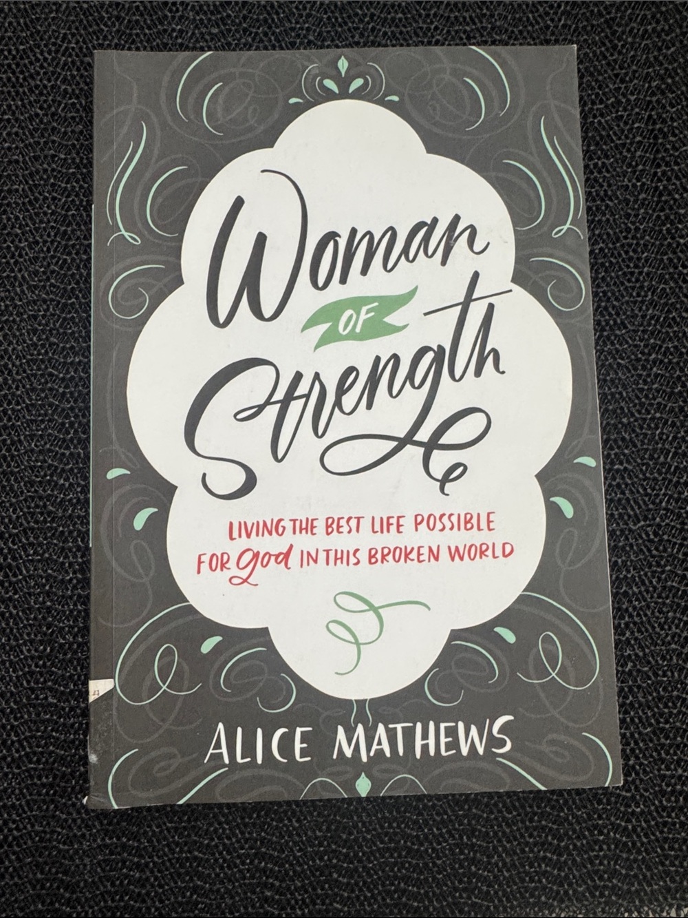 Woman of Strength by Alice Mathews - Black, White & Mint Cover